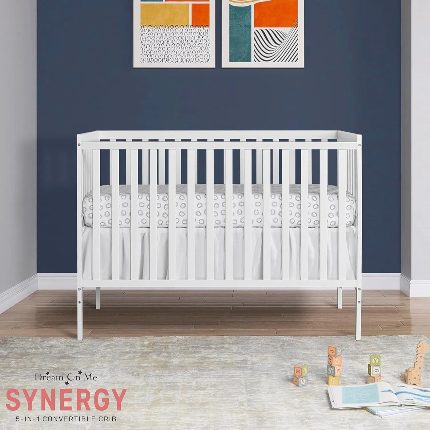 Synergy 5-In-1 Convertible Crib In White, made of New Zealand Pine wood, JPMA & Greenguard Gold Certified, features 3 mattress height settings